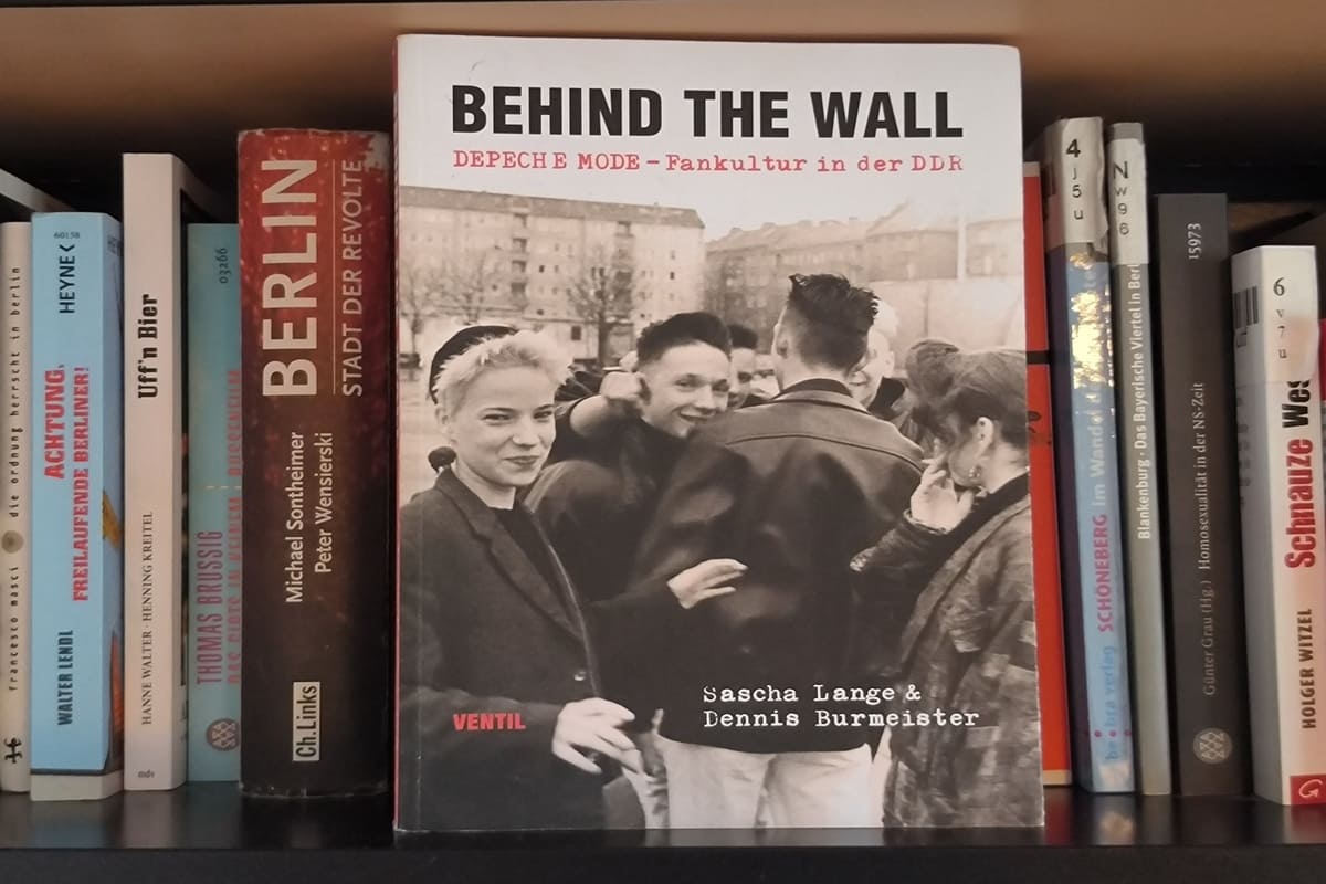 Behind the wall